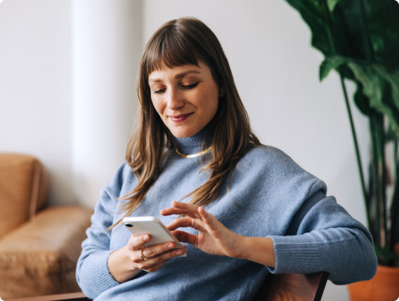 Woman using SMS service